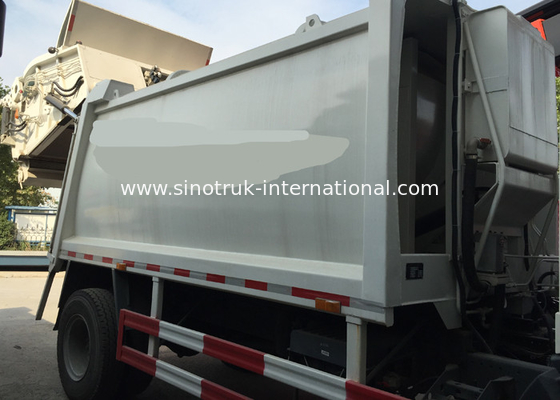 SINOTRUK는 쓰레기 수거 트럭 10-12CBM LHD 4X2 ZZ3161M4311를 압축했습니다