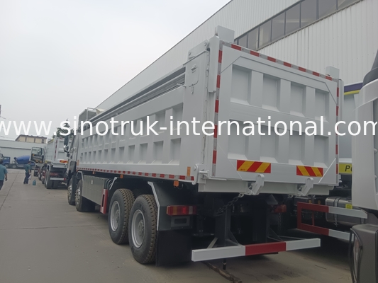 시노트룩 HOWO 380HP 탭 덤프 트럭 12 바퀴 LHD 31 톤 20-30CBM V7-X 캐빈